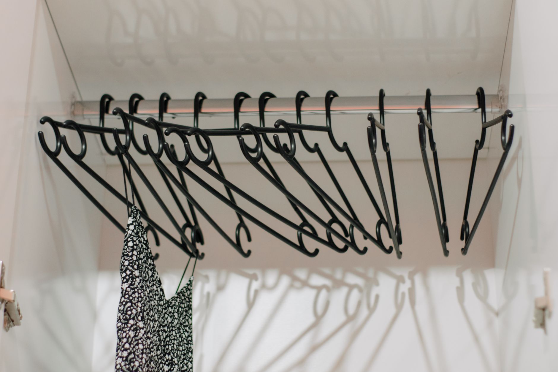 Carefully folded laundry in light closet